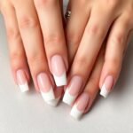 The Timeless Elegance of Square French Tip Acrylic Nails Classic square French tip acrylic nails on well-manicured hands