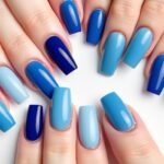 Collection of blue square acrylic nails in various shades and designs