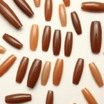 Collection of elegant brown acrylic nail designs in various shapes and shades