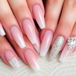 Elegant prom acrylic nails in various styles including French tips, glitter, and ombre designs perfect for special occasions