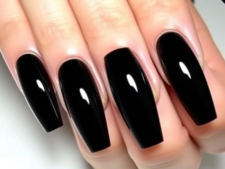 Glossy black acrylic nails in coffin shape