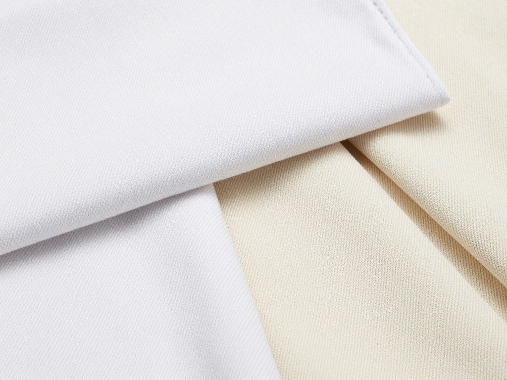 Different white denim fabric swatches and washes