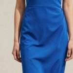 Model wearing a vibrant electric blue dress for spring outfits 2026