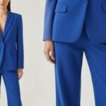 Model wearing electric blue monochromatic outfit for spring 2026 trends