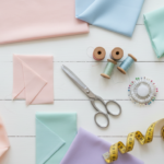 colorful fabric pieces and sewing supplies arranged on white table for easy sewing projects for beginners