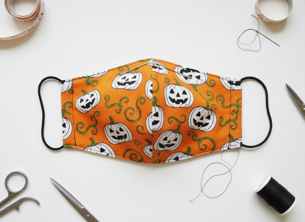 diy halloween face mask pattern with pumpkin print fabric