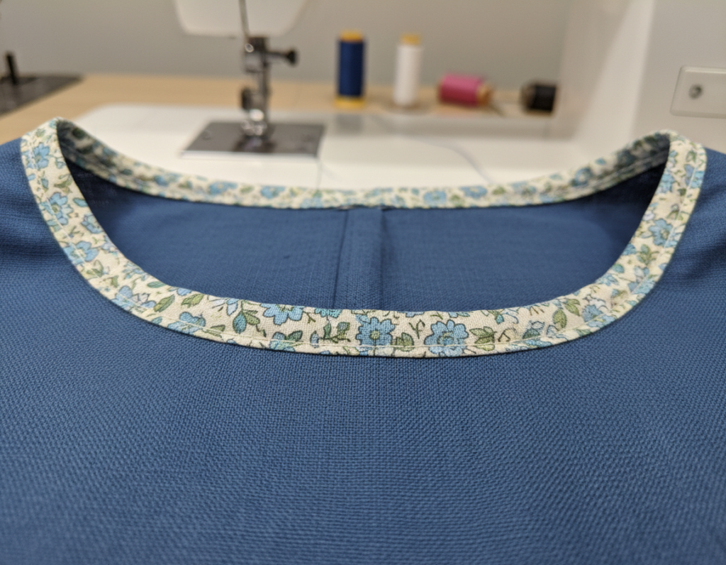 finished bias binding detail on top neckline