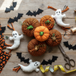 halloween sewing projects free pattern displayed on rustic wooden table with fabric scissors and orange thread